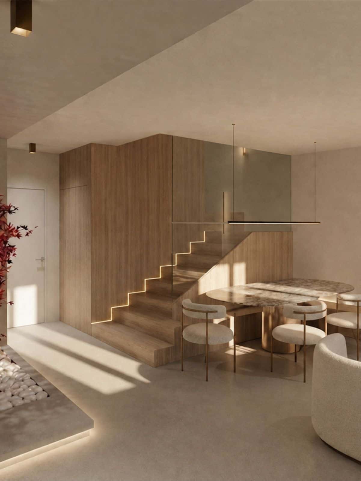 Zona giorno moderna con giardino zen indoor, scala in legno con parapetto in vetro e tavolo da pranzo